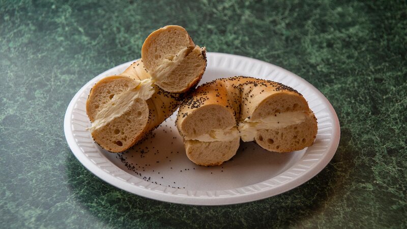 Poppy seed bagel with cream cheese