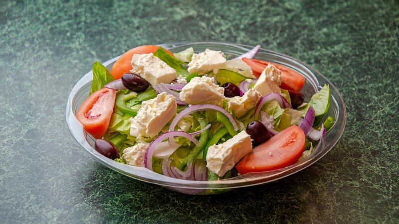 Salad topped with feta cheese