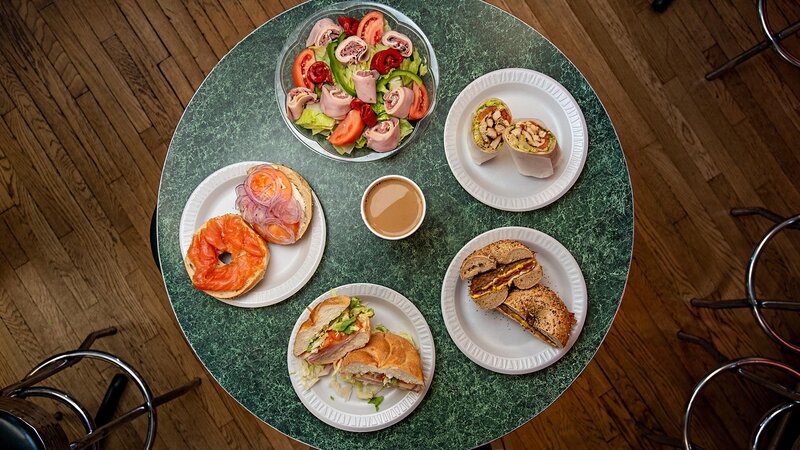Variety of different sandwiches and a cup of coffee
