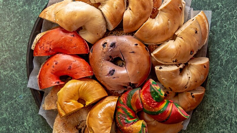 A variety of bagels on a platter